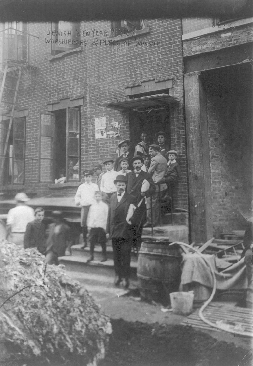 Jewish worshippers attend a Rosh Hashanah service held in a New York City tenement building.