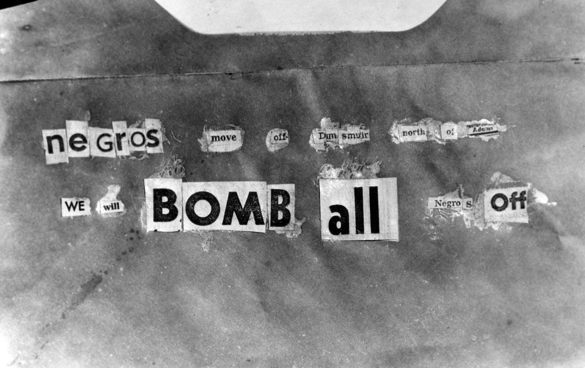 Photograph of bomb threat found at William Bailey's house in Los Angeles, taken in March 1952.