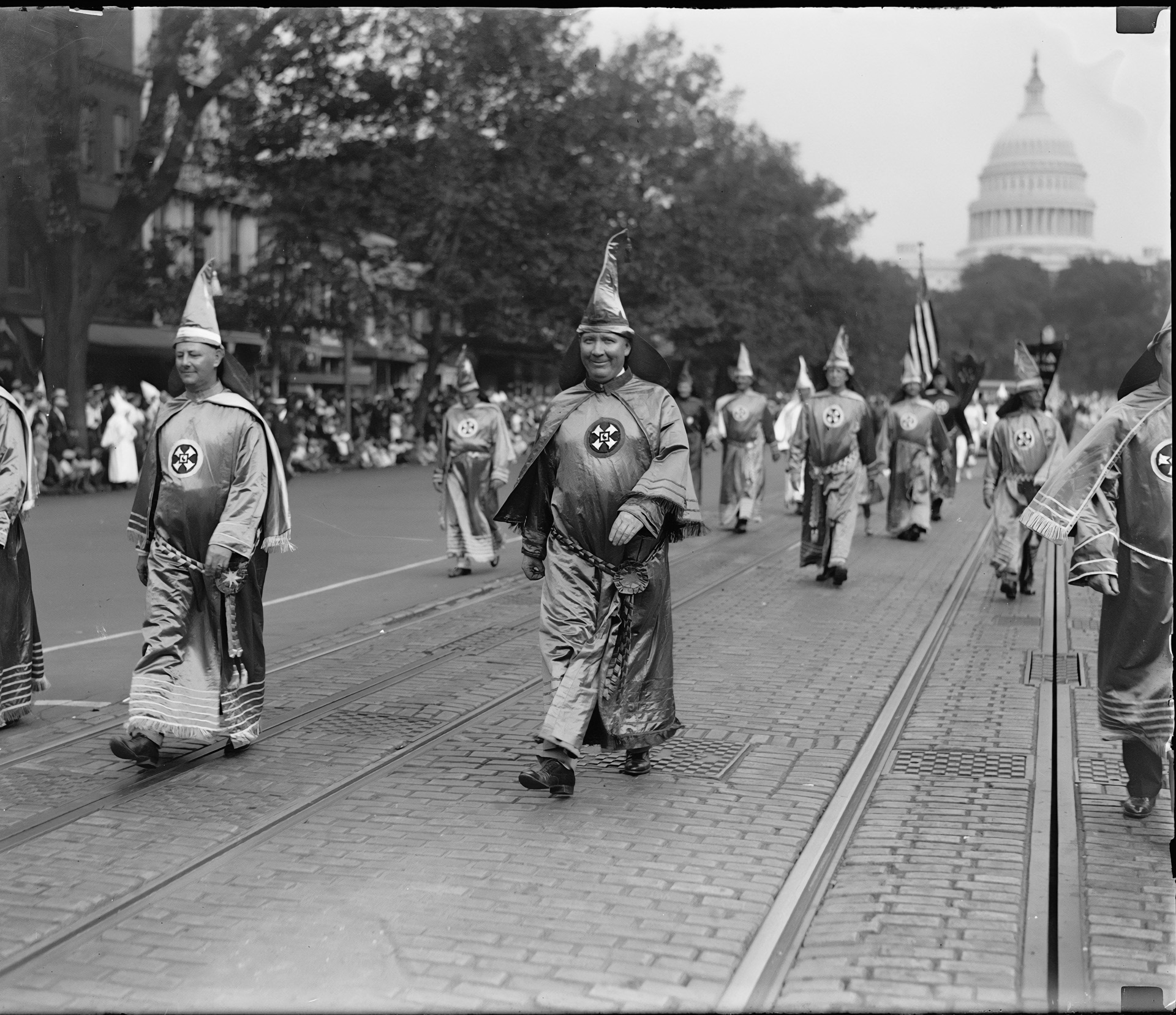 In 1925, 30,000 members of the Ku Klux Klan marched in segregated Washington, DC. The next year hosted 15,000 marchers. Many marchers revealed their face with no fear of legal consequences for the group's terrorism and murder.