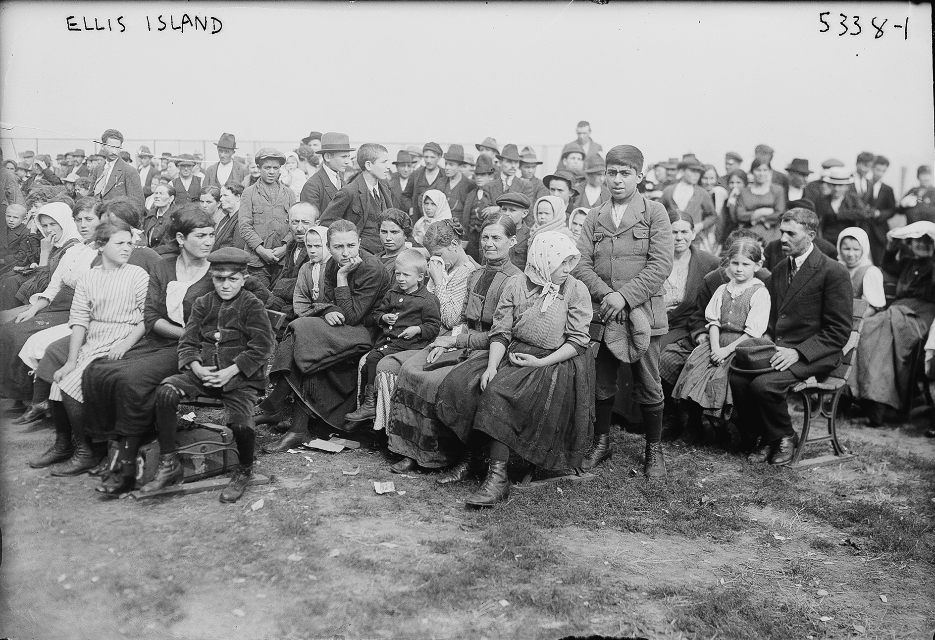 Immigrants waiting at Ellis Island.